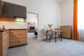 ALURE RESIDENCES 10 - 24h self check-in & private parking next to the apartment building included, CITY CENTER right on SNP Square in a quiet passage, new building, best deal in town